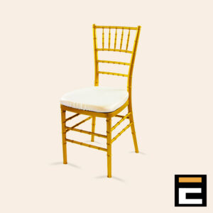 Golden wooden chair with a white cushioned seat