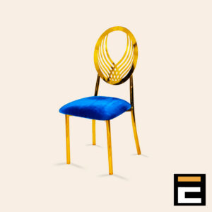 Chair with a modern gold design and blue velvet seat.