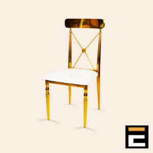 Gold chair with elegant cross-back and white velvet seat