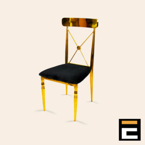 Gold chair with elegant cross-back and black velvet seat