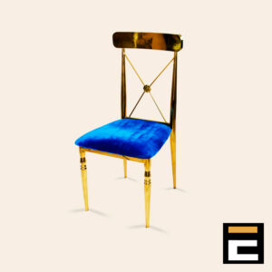 Gold chair with elegant cross-back and blue velvet seat