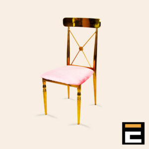 Gold chair with elegant cross-back and pink velvet seat