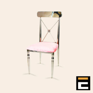 Silver chair with elegant cross-back and pink velvet seat