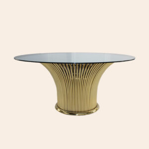 Elegant gold metal table with reinforced glass