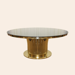 Elegant round gold table with reinforced glass