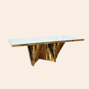 Elegant rectangular table in gold color, with tempered glass.