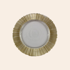 Elegant gold-colored plate, sun design